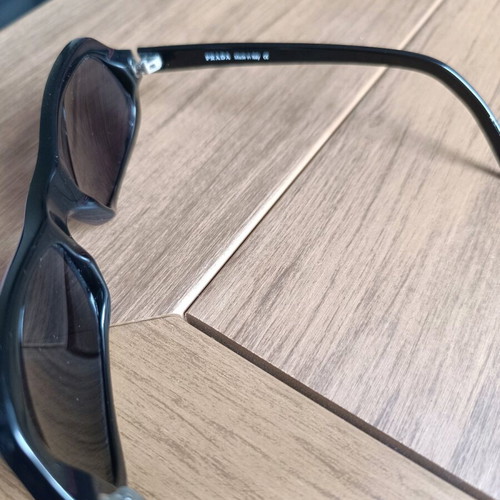 Prada women's sunglasses used, model SPR 06A 1AB-1A1, black
