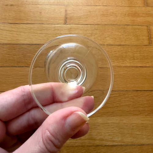 Drink glass with coin like new, collectible crystal stemmed