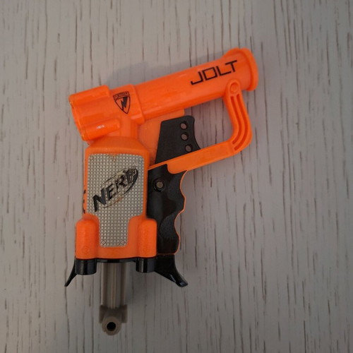 Nerf Zombie Strike Sidestrike Blaster used with two small Nerf and magazine