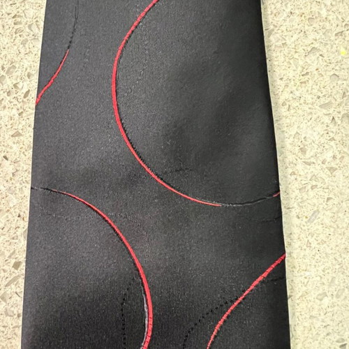 Tie like new in black and blue colors