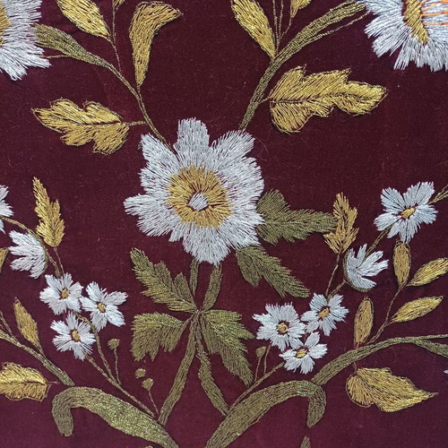Embroidered textile painting used with gold thread on velvet