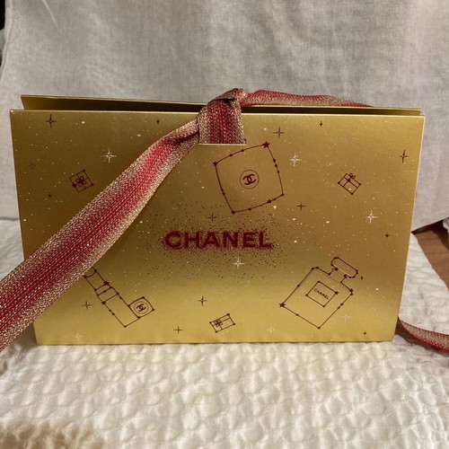 Chanel gift box new in gold color with ribbon