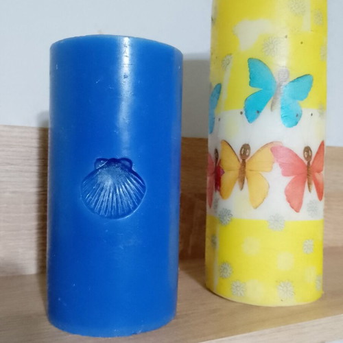 Decorative candles, blue and yellow butterfly design