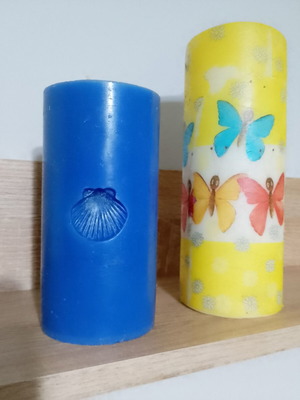 Decorative candles, blue and yellow butterfly design