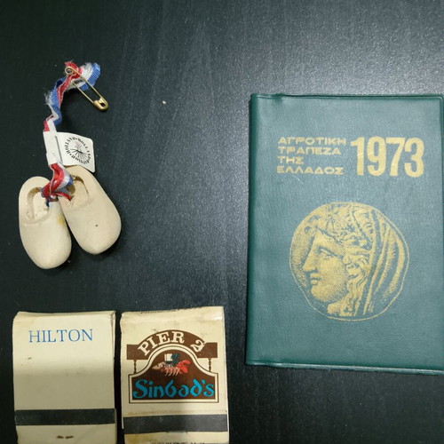 Old used hotel matchboxes with wooden clogs and 1973 calendar