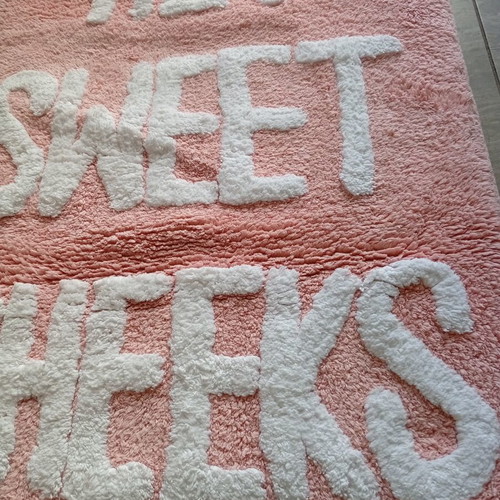 Hey Sweet Cheeks cotton bath mat pink with white letters