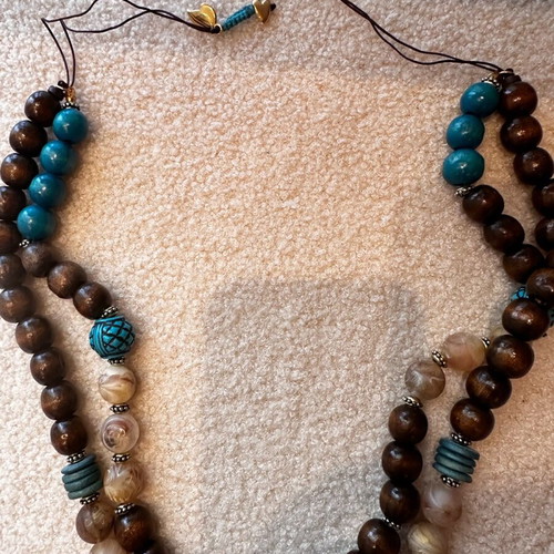 Long handmade necklace with wooden beads in brown and turquoise, like new