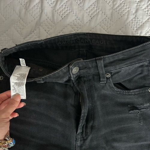 American Eagle black ripped jeans used, size S