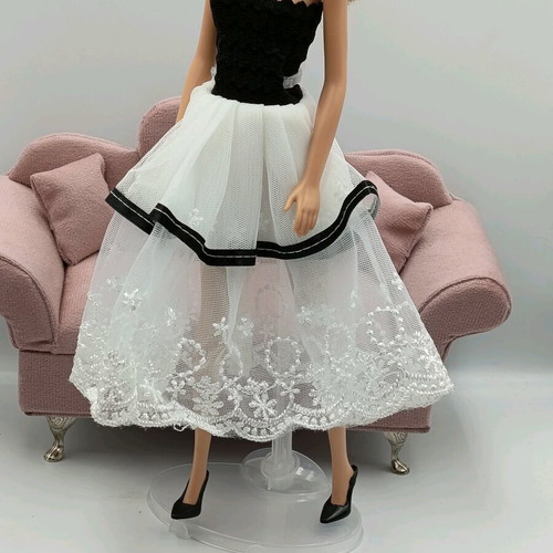 Dress and shoes for dolls like new