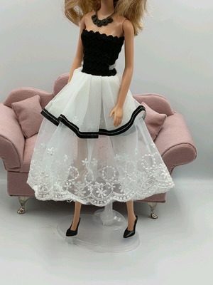 Dress and shoes for dolls like new