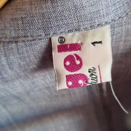 Shirt with shoulder pads like new, short sleeve, loose fit