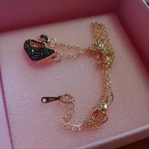 Swan necklace like new, pink gold tone with black stones