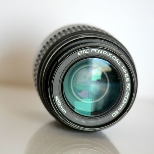 Pentax K10 DSLR camera used with lenses and case