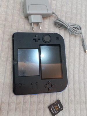 Nintendo 2DS used with memory card and original charger