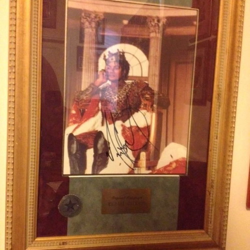 Michael Jackson autograph used in framed glass display