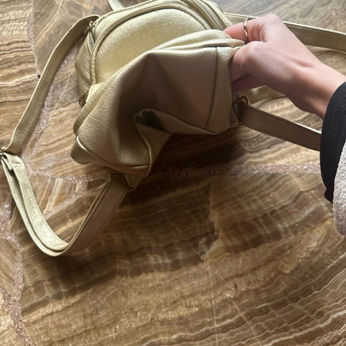 Backpack like new, gold color