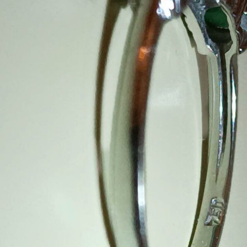 Ring with emeralds in white gold 750, like new