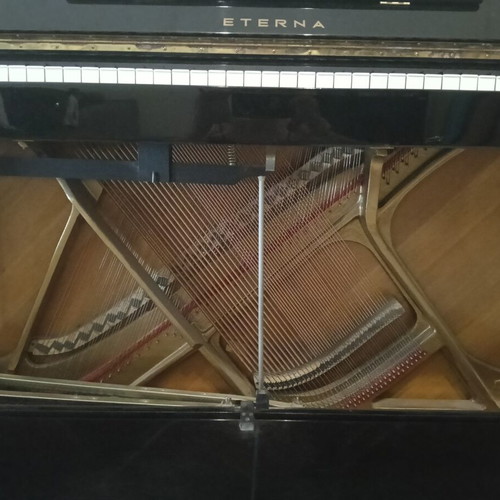 Eterna Yamaha upright piano like new with storage bench