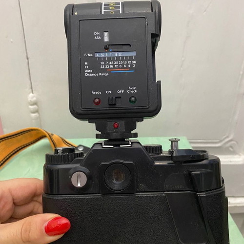 Vintage Zenit camera used with external flash