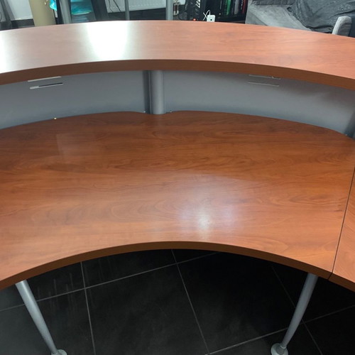 Reception desk used with metal perforated front panel