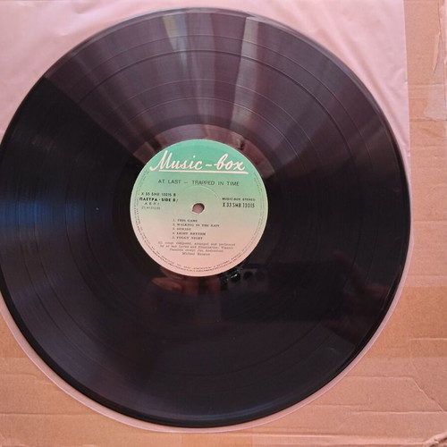 At Last Trapped In Time LP used, rock