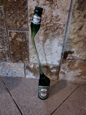 Heineken vintage bottle with twisted neck like new collectible