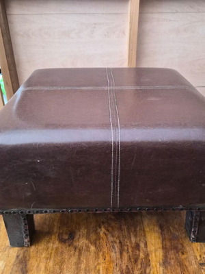 Leather stool used with minor scratches and dents