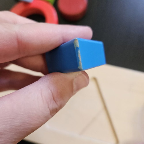 Hape shape puzzle used with marks from small hands