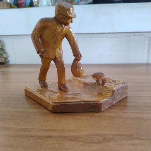 Handmade carved wooden man decoration used