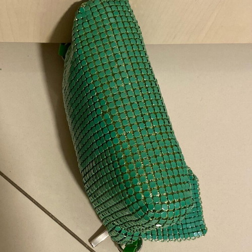 Migato green hand bag like new, satin interior