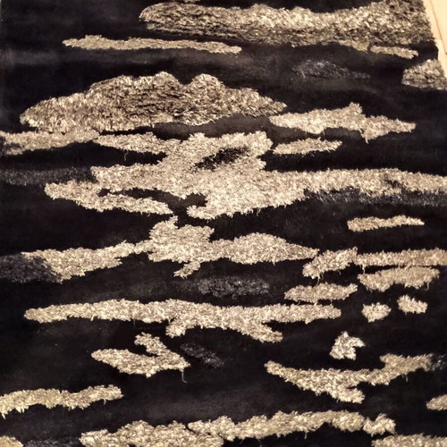 Black and silver rug with embossed designs 216x155 cm