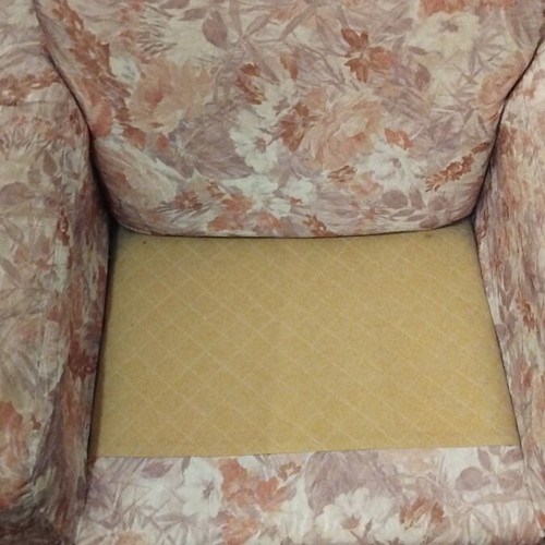Armchair used with cover in good condition
