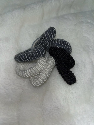 Set of hair elastics new, two black, gray and white
