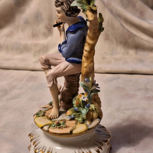 Capodimonte porcelain boy with flute like new with artist signature