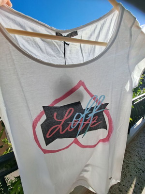 Please Tshirt new, white with heart print, size medium