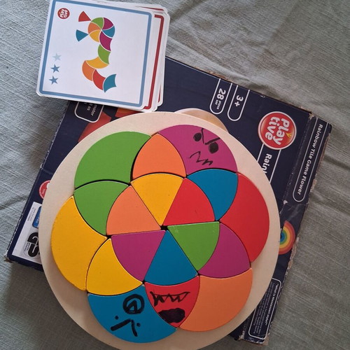 Wooden puzzle for ages 3+ used with cards and box