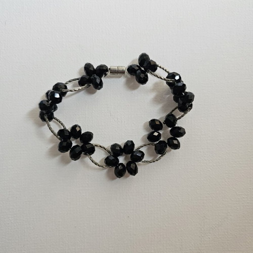 Handmade bracelet with black flower beads, like new, Apefthon