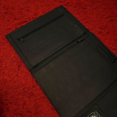 Clutch used, black with gold clasp, leatherette material