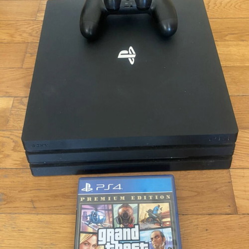 Sony PlayStation 4 Pro 1TB gaming bundle with controller and GTA V