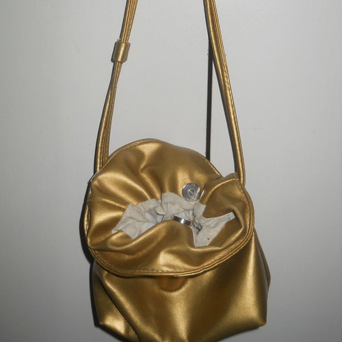 Handheld pouch bag used in excellent condition