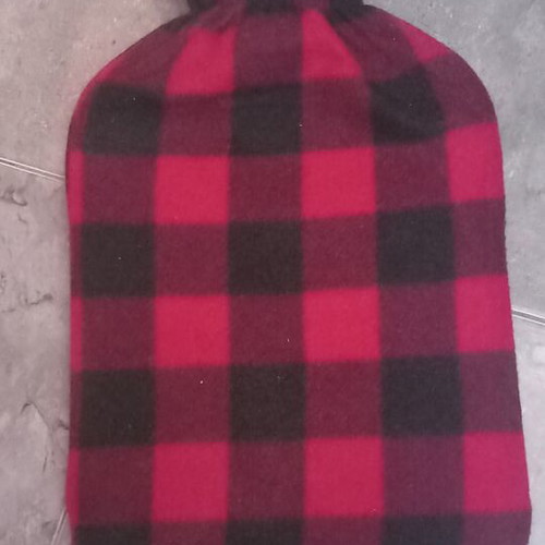 Matsuda hot water bottle with fleece cover used, buffalo plaid