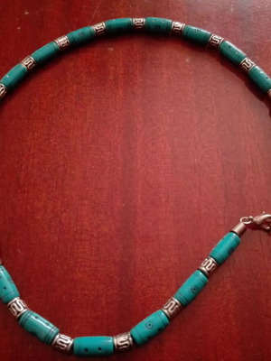 Necklace with blue and silver beads used