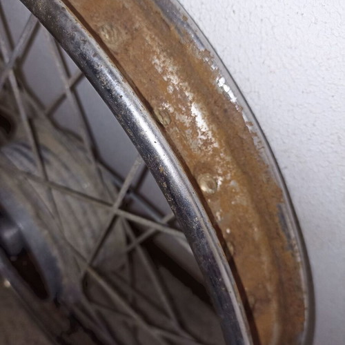 Motorcycle rim used, old with surface rust and missing spoke