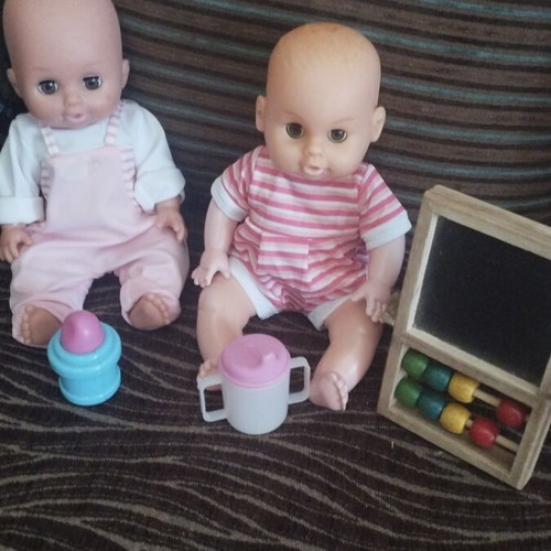 Baby dolls with extra toys, pack of 2