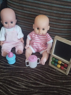 Baby dolls with extra toys, pack of 2