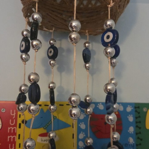Ceiling decoration with blue matohandra beads, about 70 cm height