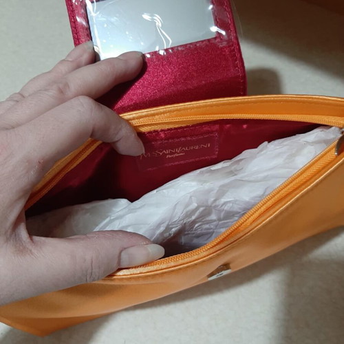 Yves Saint Laurent clutch bag new, vintage, orange