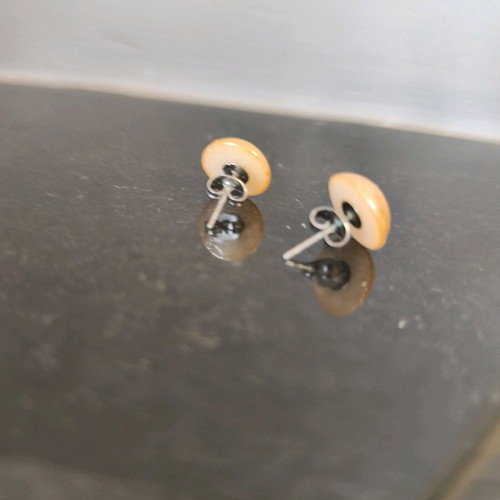 Button earrings in bright honey glossy color like new
