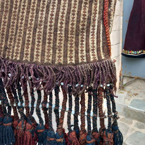 Traditional tagari used with glass beads, handmade wool