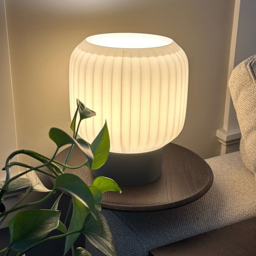Modern table lamp new with white embossed shade